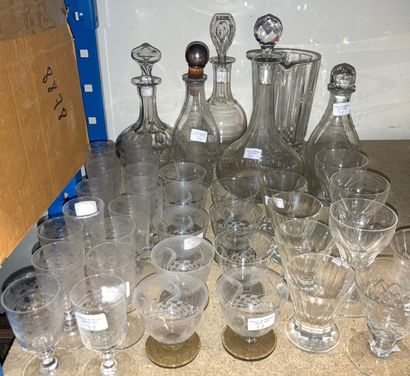 null Lot of 18 mismatched glasses, 5 carafes, 1 water jug and carafes stoppers.

We...
