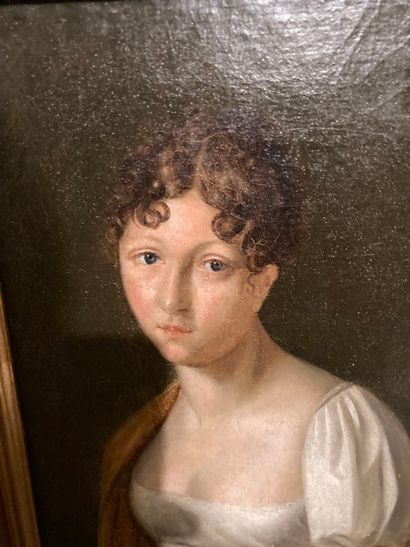 null Ecole française du XIXème siècle 

Portrait de femme à l'écharpe jaune 

Huile...