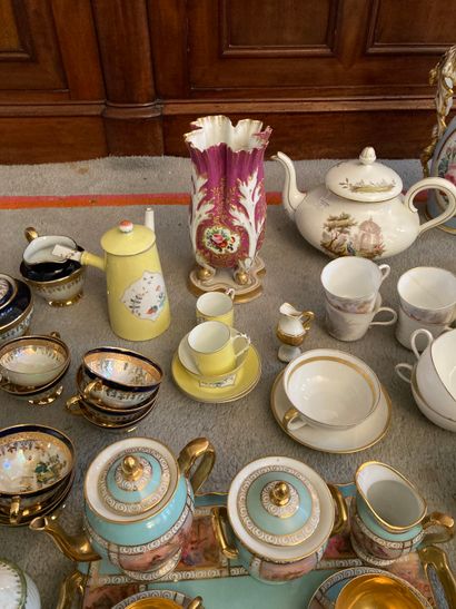 null Porcelain lot including different parts of tea and coffee service, vases, pourers,...