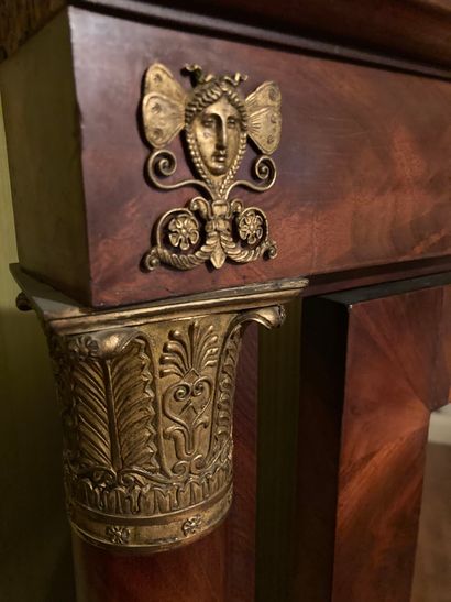 null Mahogany and mahogany veneer Psyche, bronze and gilded brass decoration of palmiform...