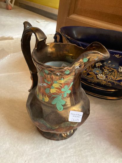 null Lot including a pitcher in Jersey, a jardinière and a vase with two handles...