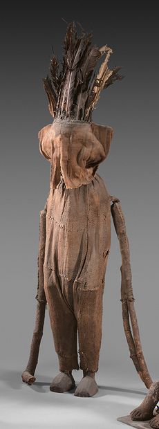 null Statuette kafigeledio Senoufo.
Ivory Coast. 
Wood, textile and feathers.
H:...