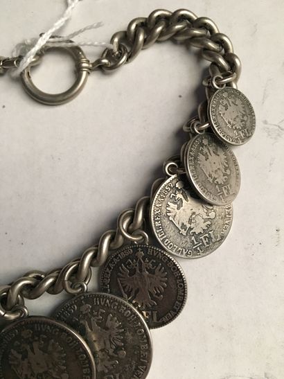 null 
Silver bracelet with 11 Florins in pendeloque, weight : 85 g

