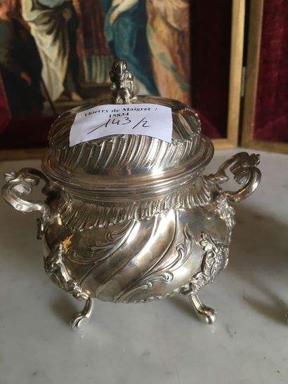 null 
Part of silver selfish service of which pourer and sugar pot, decoration foliated...