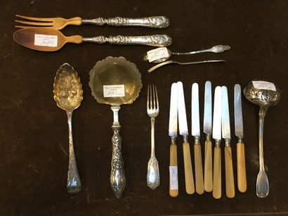 null 
Set of silver and silver-plated cutlery: 7 silver knives, sprinkling spoon,...