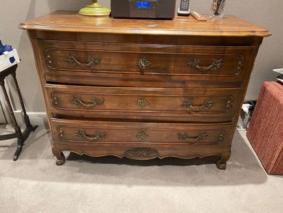 Chest of drawers in stained wood, the curved...