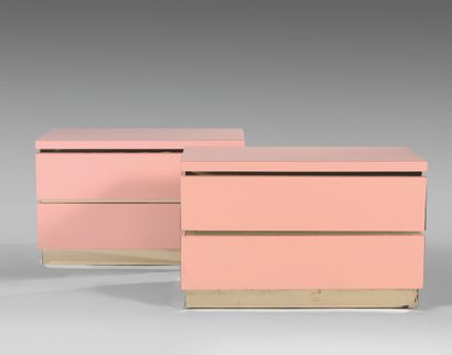 null 
Pair of wooden chests of drawers entirely covered with pink formica with two...