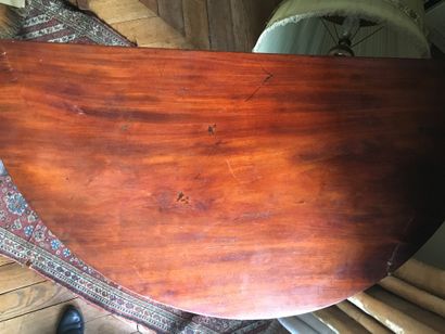 null Half moon game table with sheath base, mahogany veneer. Height 71 cm, diameter...
