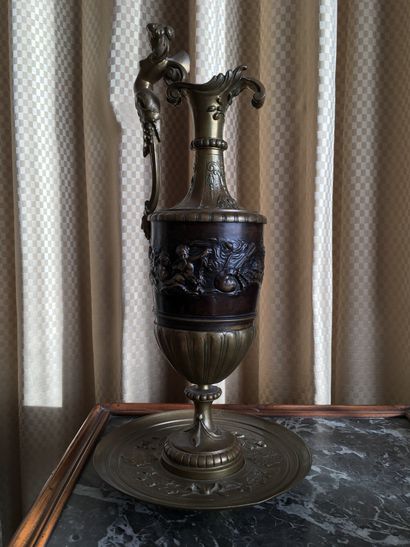Ewer and its display stand in gilt and patinated...