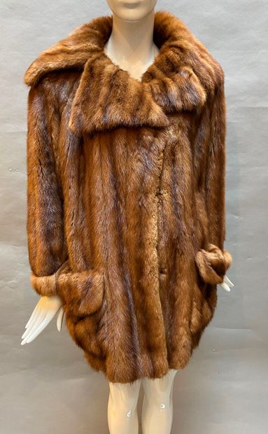 null NINA RICCI Furs

Mink jacket with vertical work, wide notched shawl collar,...