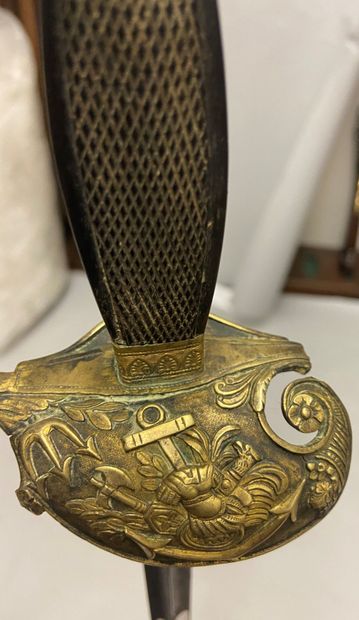 null Marine officer's sword, chased and gilded brass guard, keyboard decorated with...