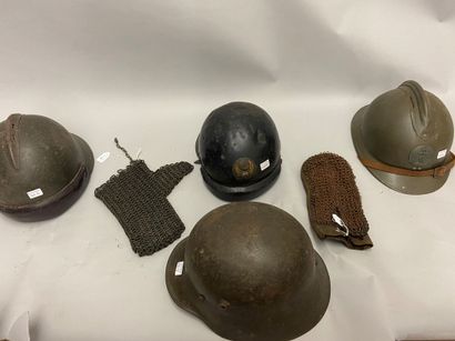 Four metal helmets: one German 1917 (without...