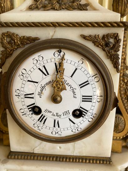 null White marble clock, decorated with an antique vase, dial signed Malhomme Marchais,...