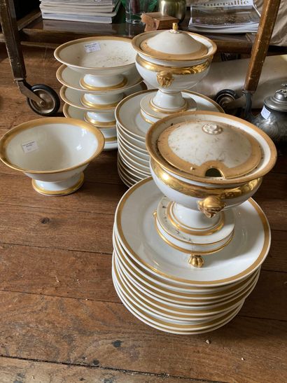null Part of white and gold service, cups, plates, drageurs

Chips and missing pieces...