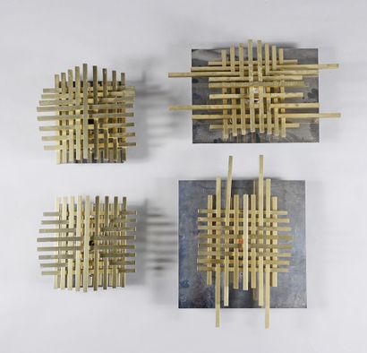 PHILIPPE JEAN (1931-1987) Suite of four aluminum sconces, decorated with a claustra...
