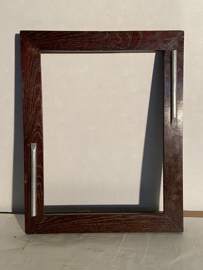 null Palm wood frame and decorative metal elements.

France, circa 1930.

38,8 x...