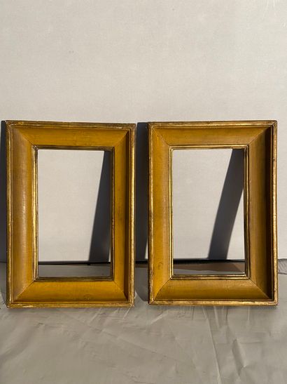 null Pair of frames in molded wood and gilded and yellow rechampi called hollow profile...