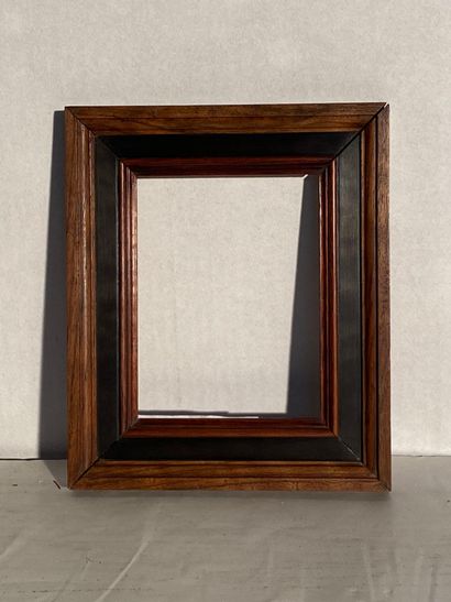 null Small frame in natural wood and molded black rechampi

19th century

12 x 9...