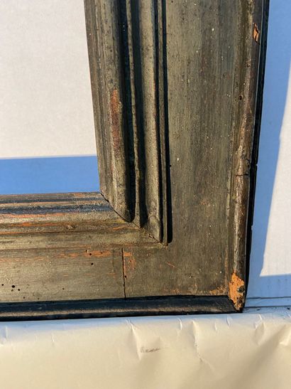  Frame called "a cassetta" in molded wood formerly silvered and green rechampi 
Spain,...