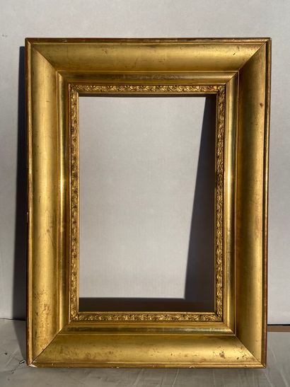 Frame in wood and pate molded and gilded...