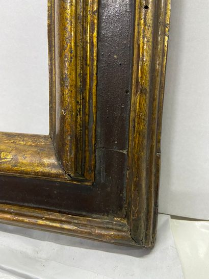 null Frame in molded wood called "a cassetta" gilded and brown rechampi

Spain XVIIth...
