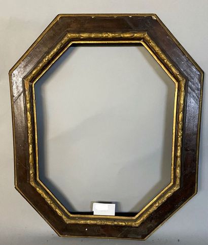 *Octagonal frame in molded wood, carved gilded...
