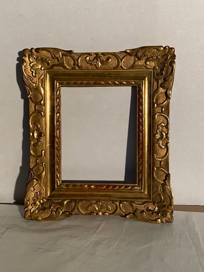 null Carved and gilded wood frame with Bérain decoration. 

France, Louis XIV period....
