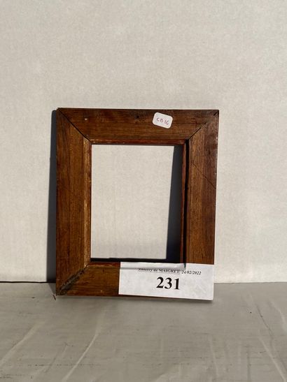 null Small frame in natural wood and molded black rechampi

19th century

12 x 9...