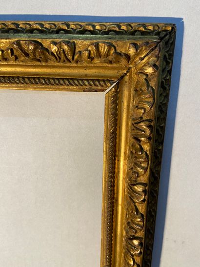 null Carved and gilded wood frame with fine decoration of cords and scrolls, stylized...