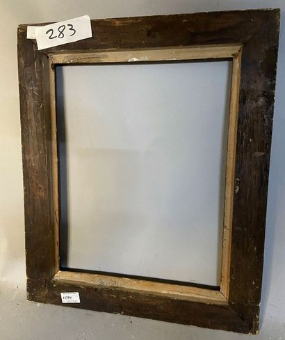 null *Molded wooden frame with reversed profile and faux green marble

Italy, Siena,...