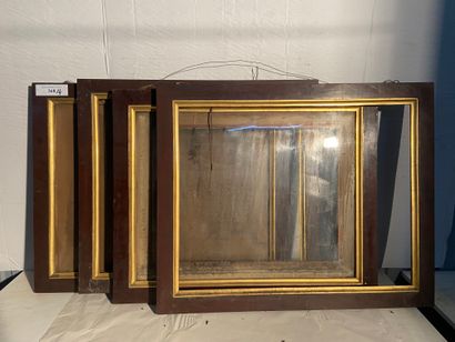 Set of four wood and veneer frames, with...