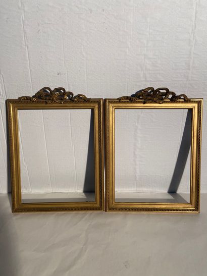 Pair of small gilded stucco frames decorated...