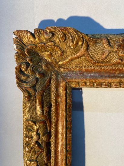 null Cadre en bois sculpté et doré à décor Bérain

Epoque Louis XIV

40 x 32 x 7...