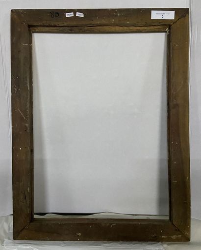 null Walnut frame with gilded and blackened mouldings and reversed profile 

Italy,...