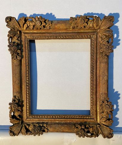 Frame in carved wood, formerly gilded, decorated...