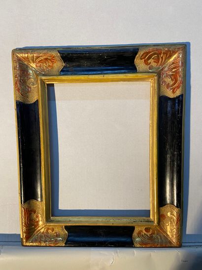 Moulded, gilded and blackened limewood frame...