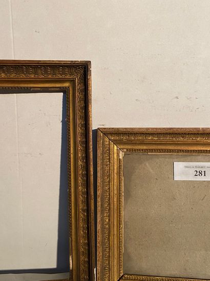 null Two frames in wood and gilded paste with palmettes decoration, one with its...