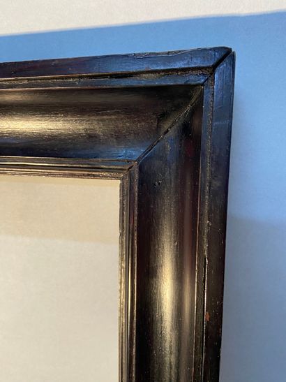 null Frame in molded and blackened wood called hollow profile

Italy, 19th century

37...