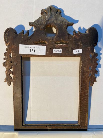  Carved and gilded wood frame with falls and pediment decoration and reparure a Bulinato...