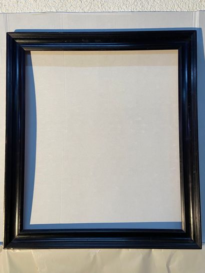 Frame in molded and blackened wood 

Italy,...