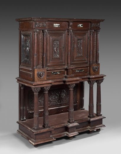 null Credenza in molded and carved oak and antique marble; the upper part opens with...