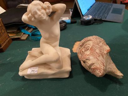 null 2 sculptures Ecole 1900 et Ecole moderne

Femme nue assise sur un coussin et...