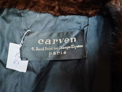 null 
CARVEN

Coat in black SHEEP, shawl collar and facings in glossy female mink,...