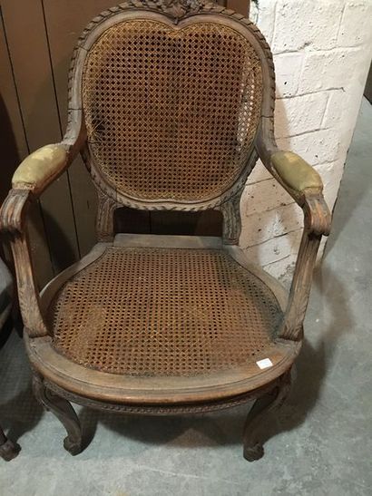 null Pair of caned armchairs in carved natural wood, Transition style, end of the...