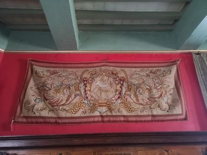 null Tapestry with small points with heraldic decoration of rinceaux framing a greyhound,...