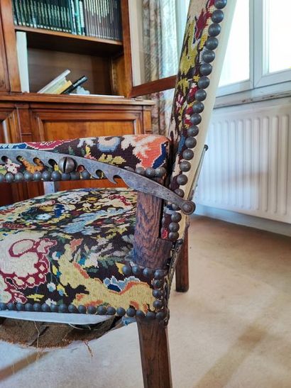 null Patient's armchair in part of Louis XIII period. Upholstery of floral fabric...