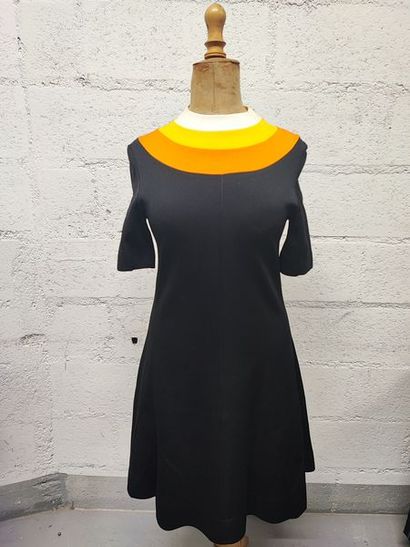 null Lot including:

- A black polyamide and nylon blend short sleeve dress, round...
