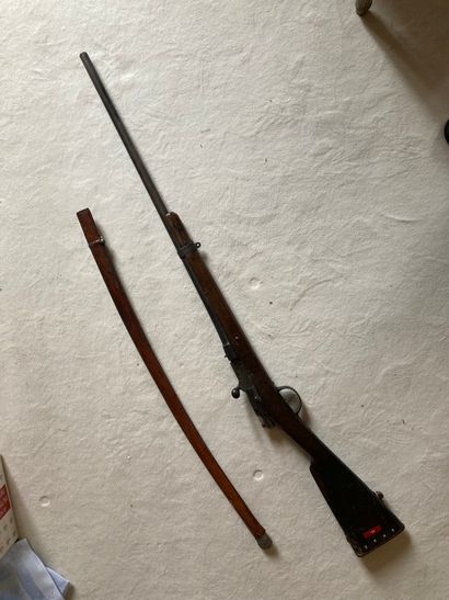 null 
Une carabine model 1874 (accidents et restaurations) 

on y joint un fourreau...