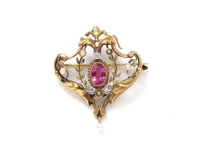 null Broche en or 750 millièmes, ornée d'une pierre rose entourée d'une frise feuillagée...