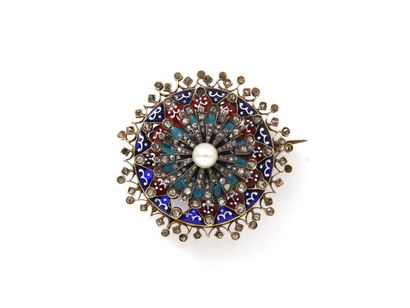 Round brooch in gold 750 thousandths and...